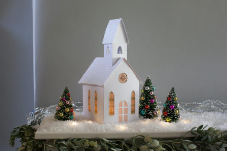 Pop-up White Church on mantle by Dimensional Paperworks